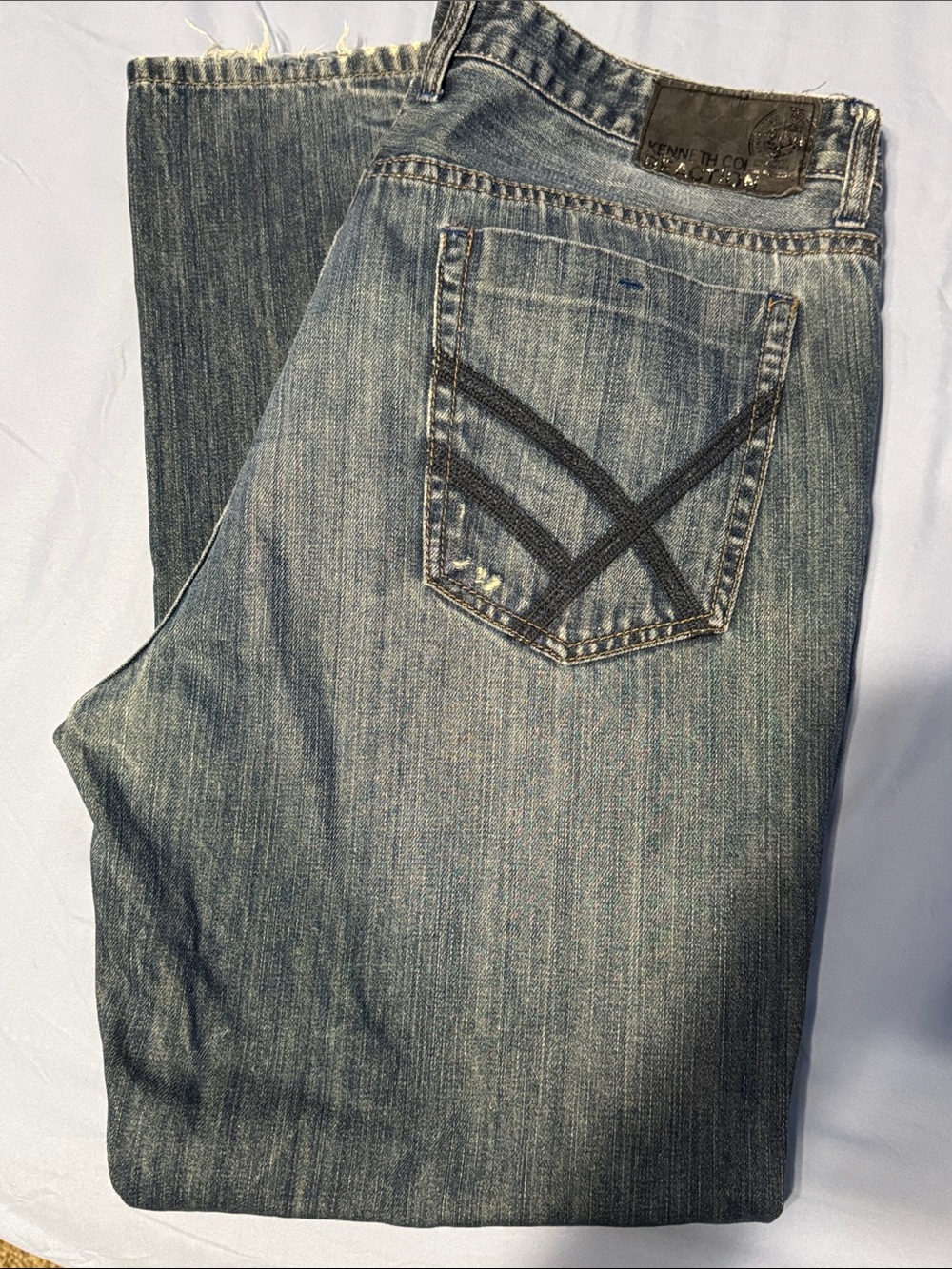 Kenneth Cole Men’s Faded Blue Straight Jeans
